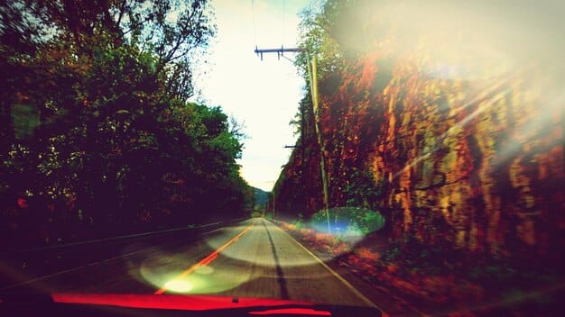 An image showing a rearview mirror focusing on the past, while the road ahead is blurred and indistinct, symbolizing the limitation of using past data to predict the future.