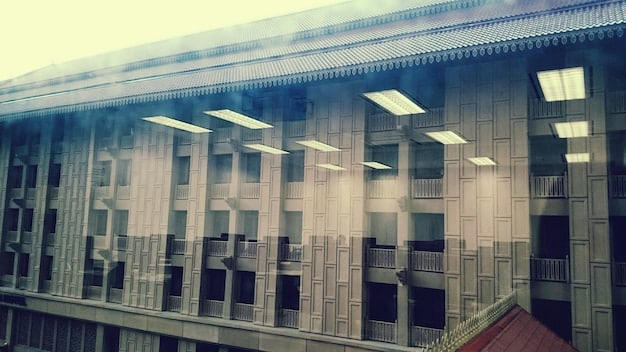 A visual representation of the Federal Reserve building with overlaid graphs showing interest rates and inflation trends.