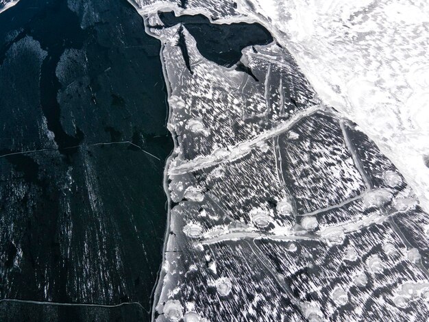 A side-by-side comparison of two maps: one accurately depicting a coastline based on modern satellite data, and another, a historical map showing the same coastline with significant inaccuracies and embellishments, highlighting the evolution of cartographic knowledge and techniques.
