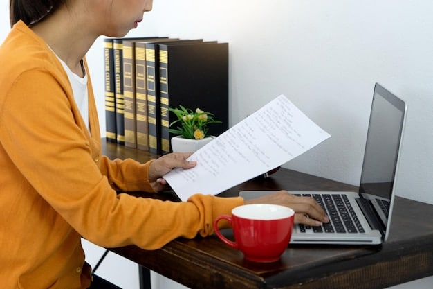 A person using a computer with a legal dictionary displayed on the screen. The person is pointing to a specific entry with the term 